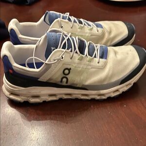 On Running Men's Sneakers in White, Blue, and Black